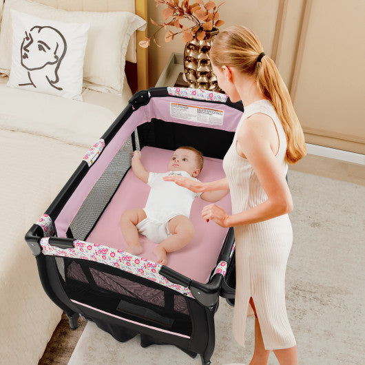 4 in 1 Portable Pack and Play Baby Nursery Center with Bassinet-Pink